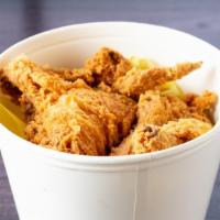 Chicken Bucket - 24 Pieces (Large) · Served with three sides: waffle fries, coleslaw or mashed potatoes.