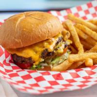 Boom Boom Burger With Fries · American cheese, lettuce, tomato, boom boom sauce on brioche bun.