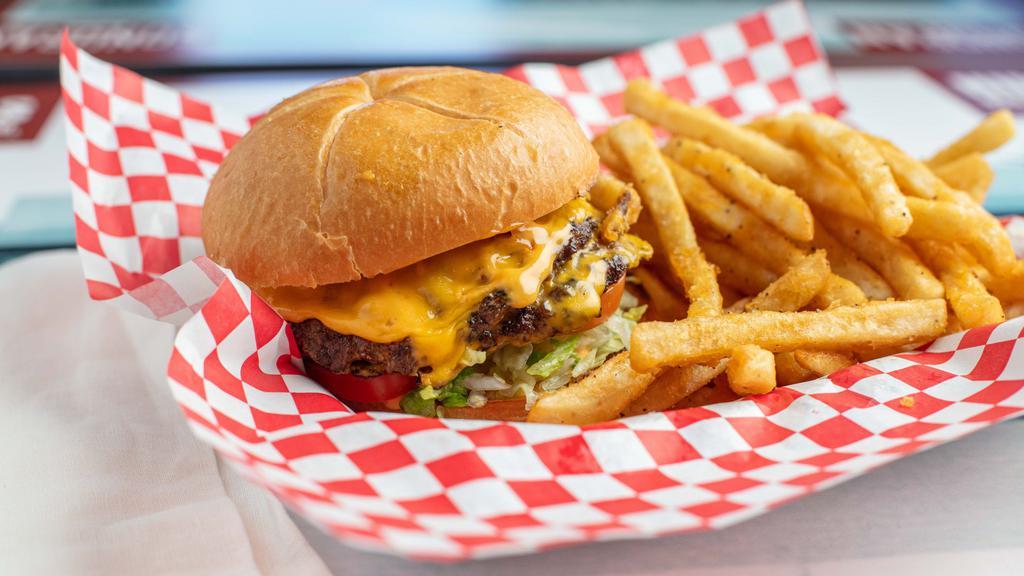 Boom Boom Burger With Fries · American cheese, lettuce, tomato, boom boom sauce on brioche bun.