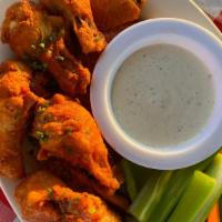 Chicken Wings · Carrots, celery, choice of ranch or bleu cheese, tossed in honey sriracha, whisky BBQ sauce,...