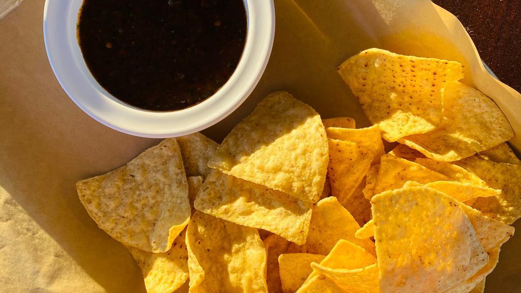 Chips And Salsa · Thinly sliced and crispy.