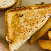 Green Chile Turkey Melt · Thin sliced turkey breast on sourdough, monterey and pepperjack cheeses, hatch green chile, ...