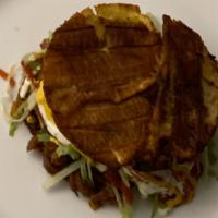 # 11 Patacon De Pollo / Chicken · Toasted fried banana with chicken, lettuce, mozzarella cheese, mayonnaise, tomato sauce and ...