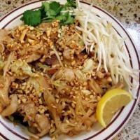 Pad Thai · Rice noodles, chicken, bean sprouts and green onions served with pad Thai sauce and crushed ...