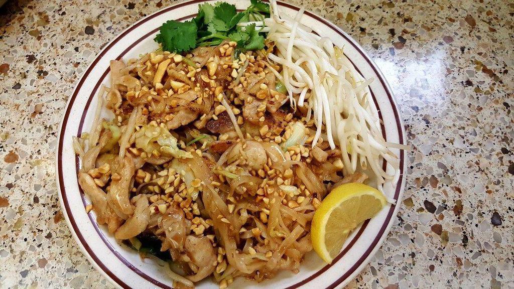 Pad Thai · Rice noodles, chicken, bean sprouts and green onions served with pad Thai sauce and crushed peanuts.