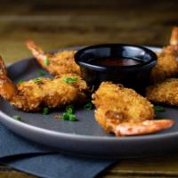 Coconut Shrimp · Coconut breaded shrimp served with a house sweet and sour sauce.