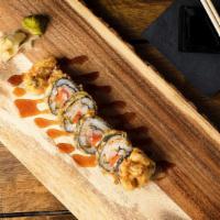 Fuku In Vegas Roll · Tuna, salmon, yellow tail, cucumber and cream cheese, lightly tempura battered and topped wi...