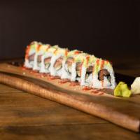 Wildcat Roll · Salmon, cucumber, jalapenos, topped with avocado and Sriracha.