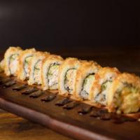 Tempura California Roll · Crab mix, avocado and cucumber, lightly tempura battered and topped with eel sauce.