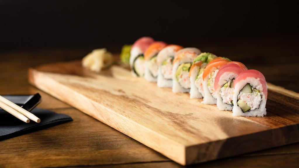 Rainbow Roll · Crab mix, avocado, cucumber topped with tuna, salmon, yellow tail, shrimp and avocado.