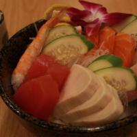 Chirashi Bowl · 15 pcs of fish chef's choice arrange over a bowl of sushi rice.