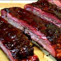 Bbq Spare Ribs (4) · Bone in pork spare ribs with homemade barbecue sauce.