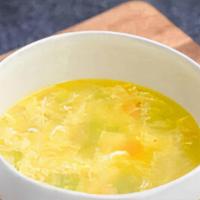 Egg Drop Soup · Traditional soup with sweet corn, celery, water chestnut and egg.