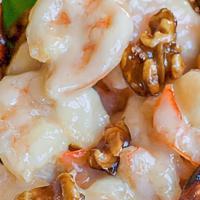 Honey Walnut Shrimp · Lightly breaded shrimp tossed in a creamy sweet mayo walnut sauce with steamed broccoli and ...