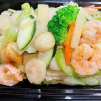 Treasures Of The Sea · Stir fried with shrimp, scallops. crab meat and assorted vegetables in a clear garlic wine s...