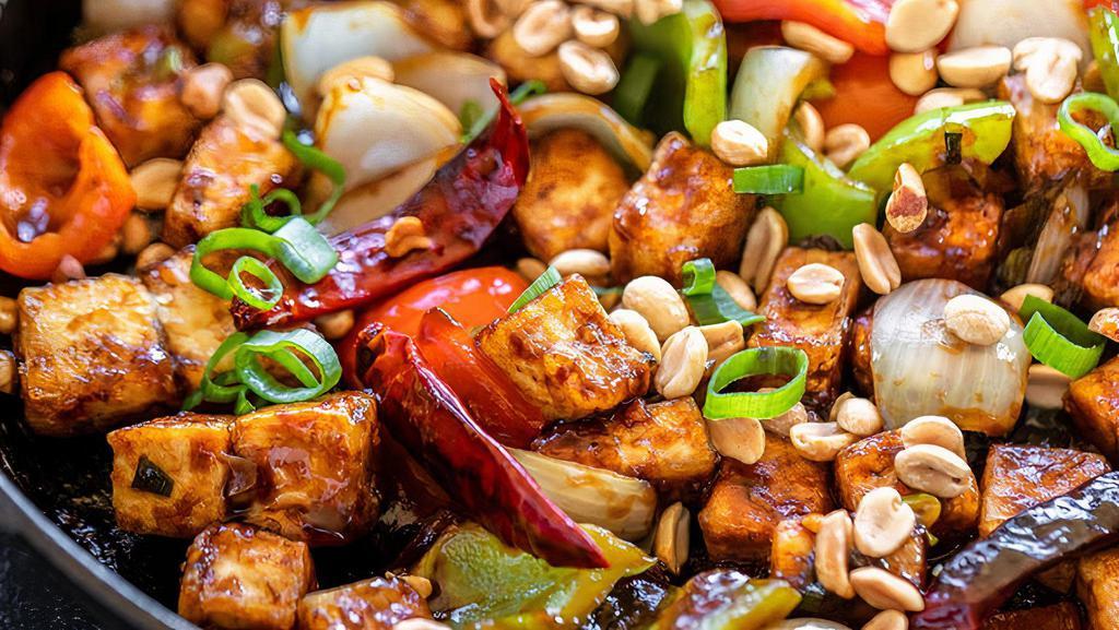 Kung Pao Tofu · Spicy. Light fried tofu, water chestnuts, bell pepper, onions, zucchini, celery and peanuts in spicy kung pao sauce.