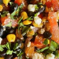 Side Black Bean And Corn Salad* · ‭Black beans, corn, tomatoes, fresh basil and feta cheese tossed in a honey balsamic vinaigr...