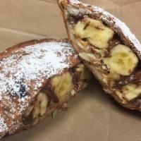 No 55* · Peanut butter, nutella, bananas, roasted almonds, and powdered sugar