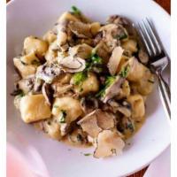 Truffle Gnocchi · Crema, Mushroom Ragu, Shaved Truffle.