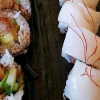 Shrimp Tempura  · Crispy tempura shrimp rolled with kaiware, avocado, cucumber and eel sauce.
