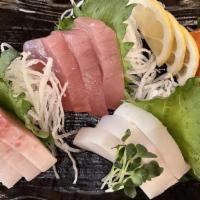 Large Sashimi Platter · Assorted twenty pieces of Chef’s choice Sashimi.