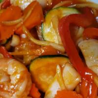 Sweet & Sour · Pineapple, onion, bell pepper, tomatoes, and carrots stir-fried with sweet and sour sauce.