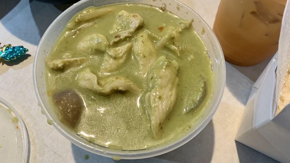Green Curry · Spicy. Green curry paste, coconut milk, bamboo shoot, eggplant and basil leaves. Spicy.
