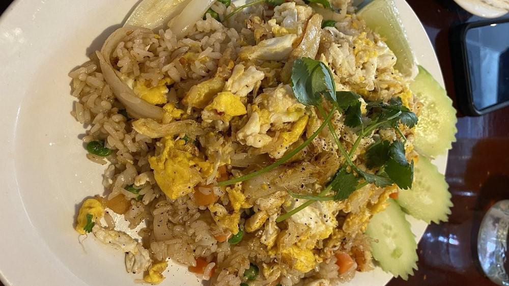Crab Fried Rice · Fresh crab meat, tomatoes, peas, carrots, and eggs.