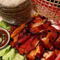 Gai Yaang · Gluten-Free. Shell Fish. Grilled chicken thighs marinade with coconut milk, served with stic...