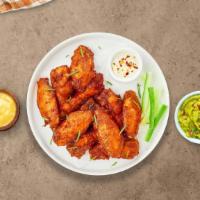 Just My Cluck Wings · Breaded or naked fresh chicken wings until golden brown. Served with a side of ranch or bleu...