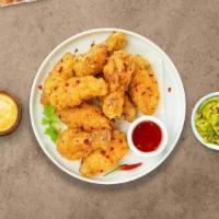 Ss Duo Wings · Breaded or naked fresh chicken wings, fried until golden brown, and tossed in sweet and sour...