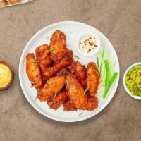 Just My Cluck Boneless Wings · Boneless breaded fresh chicken wings until golden brown. Served with a side of ranch or bleu...
