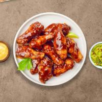 Bbq Bliss Boneless Wings · Boneless breaded fresh chicken wings, fried until golden brown, and tossed in barbecue sauce...