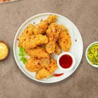Ss Duo Boneless Wings · Boneless breaded fresh chicken wings, fried until golden brown, and tossed in sweet and sour...