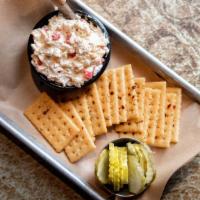 Kickin' Cheese & Crackers · Southern pimento cheese, Alabama fire crackers, and dill pickles.