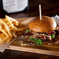 Wild West Burger · Local Distilleries. 
Certified angus beef patty®, applewood smoked bacon, Cheddar cheese, BB...