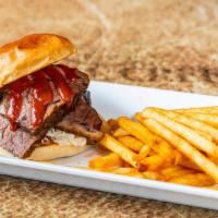 Bbq Brisket Sandwich · Smoked brisket, house slaw, and BBQ sauce.