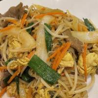 Singapore Noodles (Spicy) · Spicy. Steamed rice noodles sautéed with bell pepper, bean sprouts, eggs, and onions with sp...