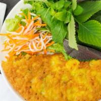Vegetarian Bánh Xèo/Vietnamese Crepe · Crispy crepe with tofu, onions, and bean sprouts. Served with lettuce, pickled carrot, and f...