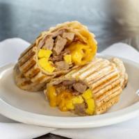 Meat Breakfast Wrap · Honey ham, bacon, pork sausage, cheddar cheese & egg wrapped and grilled in a flour tortilla.