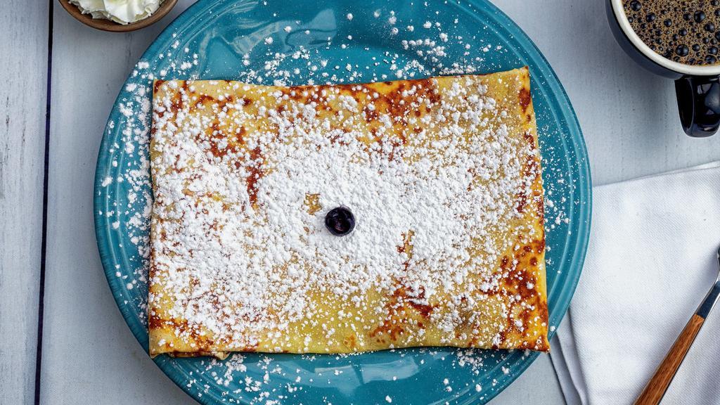 Mixed Berries Crepe · Blueberries, blackberries, & raspberries with a dulce de leche sauce topped with powdered sugar.