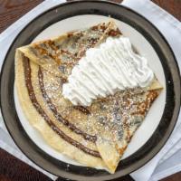 Classic Nutella Crepe · Sweet nutella topped with powdered sugar.