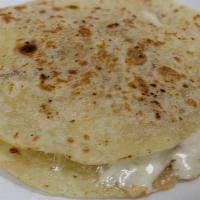 Quesadillas · Melted cheese in between two tortillas.