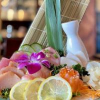 Sashimi · Chef's choice of 7 pieces assorted sashimi.