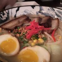 Miso Ramen · Creamy house made miso broth with choice of chashu or chicken. Bamboo shoots, sweet corn, sc...