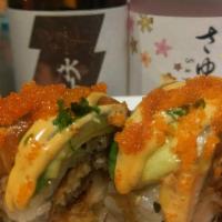 Kiku Dragon Roll · Tempura shrimp, unagi and cucumber inside. Topped with salmon, avocado, and masago. Spicy ma...