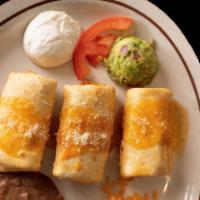 Flautas · 3 crispy flour tortillas, filled with shredded beef, shredded chicken, or ground beef topped...