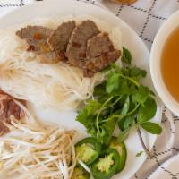 Rare Steak & Well Done Brisket Pho · Served with bean sprouts cilantro jalapenos and lime.