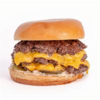 The Triple Burger · Smashed triple patties, American cheese on a squishy bun.