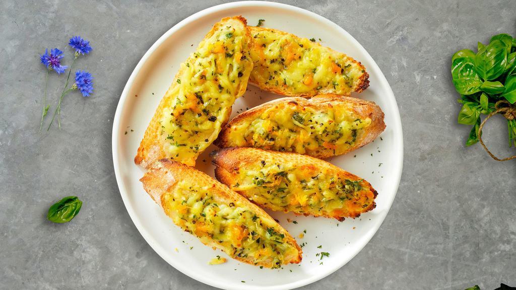 Cheese Garlic Bread · (Vegetarian) Housemade bread toasted and garnished with butter, garlic, mozzarella cheese, and parsley.